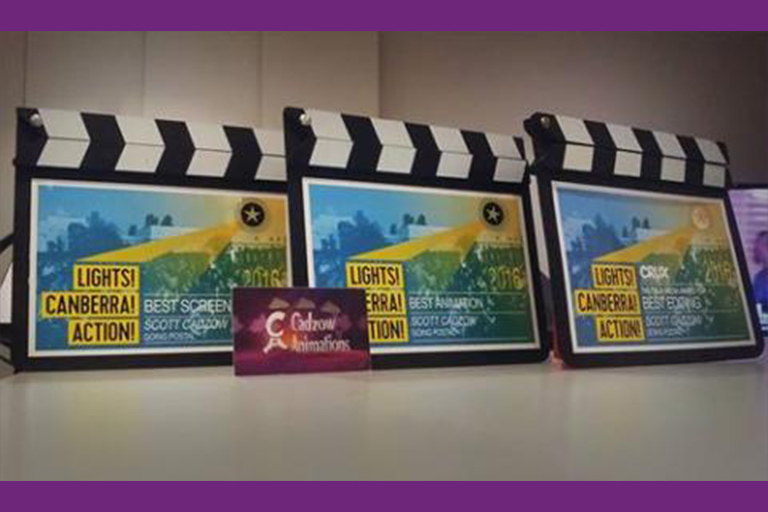 Photos of three awards